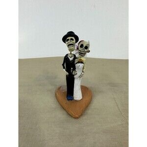 Calaca Mexico Skeleton Bride and Groom on Clay Heart